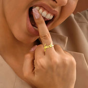 Woman model is wearing a minimalist 14k gold filled ring.